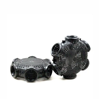 Two black mesh filter cages with multiple inlet ports, one lying on its side and one standing upright